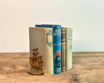 Stack of 4 antique English books, with beautiful red, beige, blue covers and a few illustrations, from the late 1800s to the 1930s