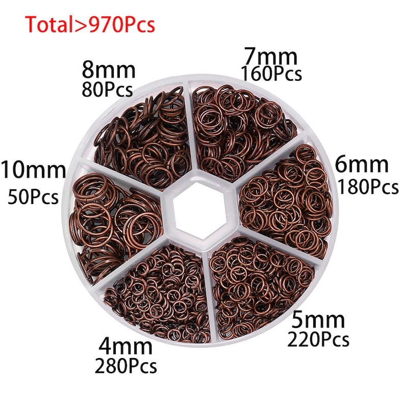 May include: A white plastic container with six compartments filled with copper jump rings. The compartments are labeled with the size and quantity of jump rings in each compartment: 4mm 280Pcs, 5mm 220Pcs, 6mm 180Pcs, 7mm 160Pcs, 8mm 80Pcs, and 10mm 50Pcs. The total number of jump rings is over 970.