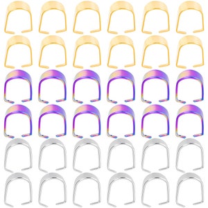May include: A set of 36 metal end caps for jewelry making. The set includes 12 gold, 12 iridescent rainbow, and 12 silver end caps.