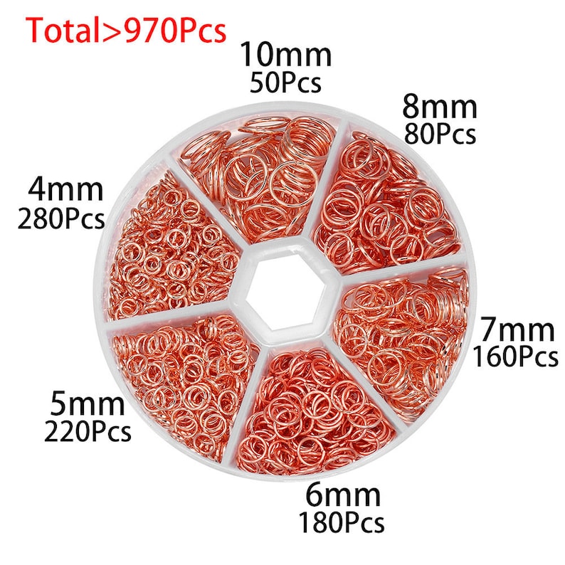 May include: A clear plastic container with six compartments filled with different sizes of copper jump rings. The container is labeled with the size and quantity of each ring, for example, "4mm 280Pcs".