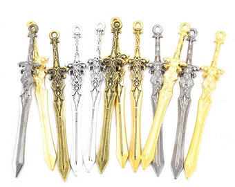 May include: A set of 10 miniature sword charms in silver and gold tones. The swords have intricate details and are perfect for adding a touch of fantasy to jewelry or crafts.