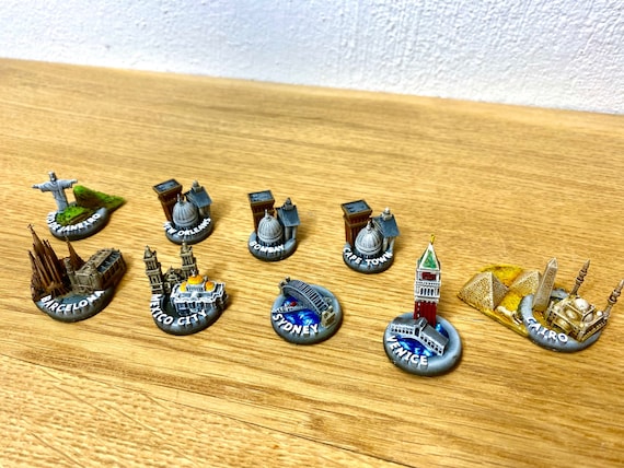9 minor city miniatures for board games like Fortune and Glory