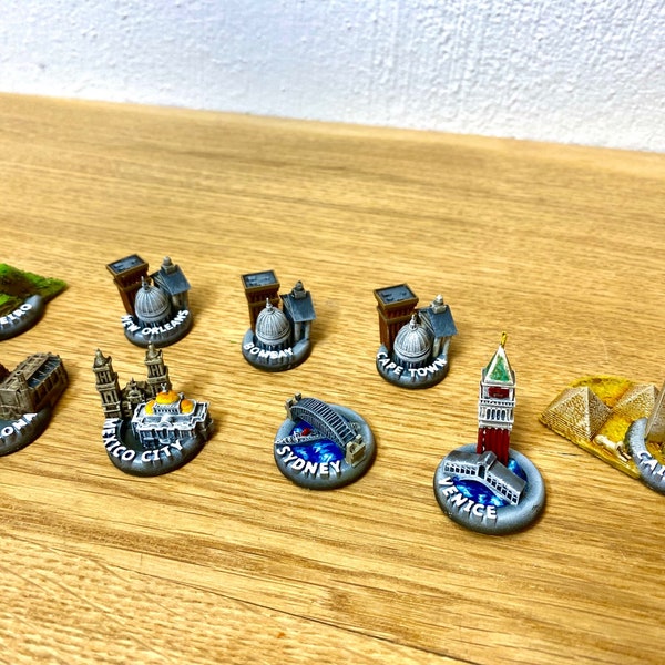 9 minor city miniatures for board games like Fortune and Glory