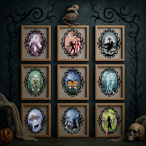 May include: Nine framed Halloween-themed art prints with oval-shaped illustrations. Each print features a unique spooky scene, including ghosts, skeletons, and a UFO. The prints are displayed on a dark teal wall with decorative branches and a bird sculpture.