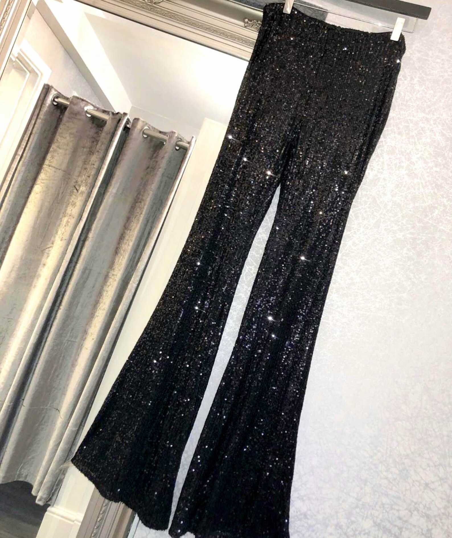 black sequin flare pants