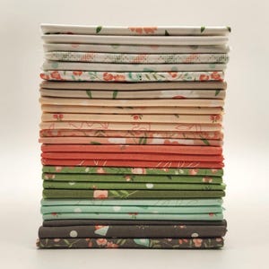 May include: A stack of folded fabric squares in various colors and floral patterns. The fabrics include shades of white, peach, coral, green, and gray. The patterns feature flowers and leaves, suitable for quilting or crafting projects.