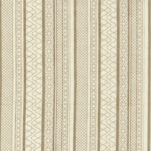 May include: Cream-colored fabric with vertical stripes in varying widths and patterns. The stripes alternate between solid tan, geometric lattice, and floral designs. The overall texture appears to be woven, creating a classic, decorative textile.