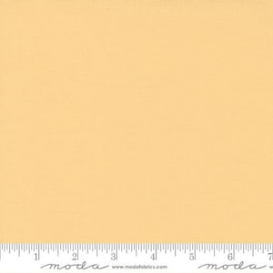 May include: A solid piece of pale yellow fabric. The fabric has a subtle texture and is perfect for quilting, sewing, and crafting.