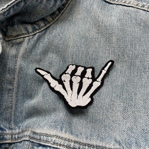 Skeleton hand “Surfs up” Shaka sign embroidered iron-on patch