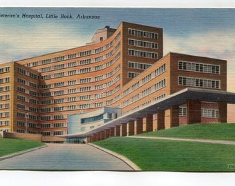 May include: Vintage postcard featuring the Veteran's Hospital in Little Rock, Arkansas. The building has a curved, multi-story design with numerous windows. The postcard has a retro aesthetic, with the text "Veteran's Hospital, Little Rock, Arkansas" at the top.