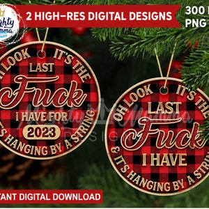 May include: Two round red and black buffalo plaid Christmas ornaments with the text "Oh look it's the last f*** I have for 2023 & it's hanging by a string" and "Oh look it's the last f*** I have & it's hanging by a string".