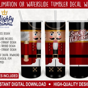May include: Three tumbler wraps featuring a nutcracker design. The wraps are red, black, and gold, with the words "Son of a Nutcracker" on one. The image includes the text "Sublimation or Waterslide Tumbler Decal Wraps" and "Mighty Mamma Designs".