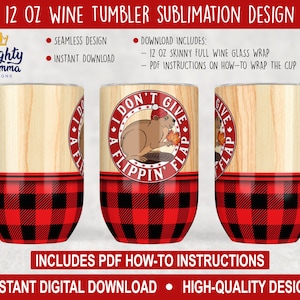 May include: Sublimation design for a 12 oz skinny wine tumbler featuring a cartoon beaver wearing a Santa hat and holding a maple leaf. The design includes the text "I Don't Give A Flipping Flap". The tumbler is shown on a wood grain background with a red and black buffalo plaid pattern.