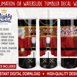 May include: A sublimation or waterslide tumbler decal wrap featuring a nutcracker design. The design includes a red, white, and black nutcracker with a gold belt and a black mustache. The text "Son of a Nutcracker" is written in gold letters on a red background. The design is available in three sizes: 20 oz straight, 20 oz tapered, and 30 oz straight.