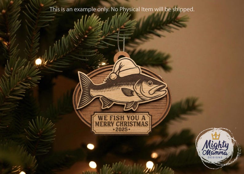 May include: Wooden Christmas ornament featuring a fish wearing a Santa hat. The ornament has the text "WE FISH YOU A MERRY CHRISTMAS 2025". The ornament is hanging on a Christmas tree.