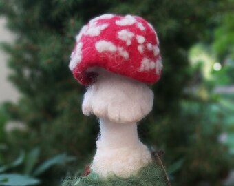 Knobby fly agaric on a piece of branch, felted lucky mushroom, entirely handmade, unique piece