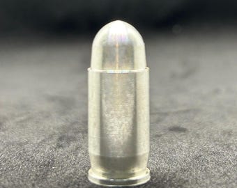 Réplica de bala 45 ACP .999 Prata Sólida Pura - 1 onça Troy.