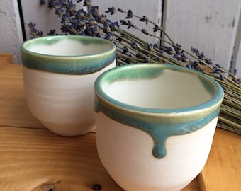 White porcelain small tea cup with green glaze