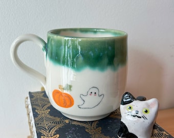 Ghost with pumpkin Halloween ceramic mug