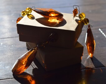 10 Pack Chandelier Replacement Crystal Prism Tear Drop Almond Two Bead Amber (Set of 10) 10 Pack Chandelier Replacement Crystal Prism Tear Drop Almond Two Bead Amber (Set of 10)