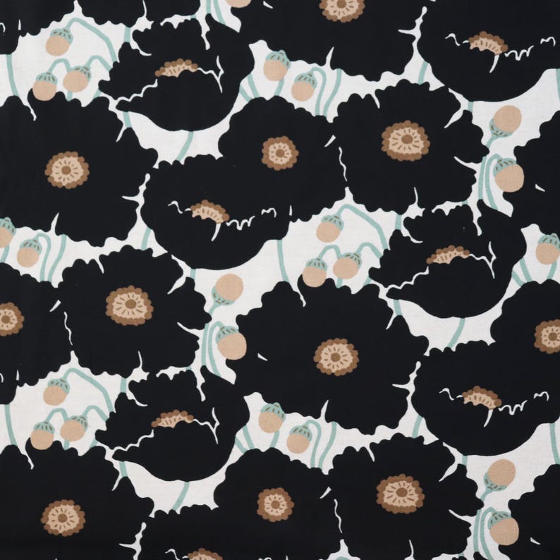 May include: A fabric with a repeating pattern of large black poppy flowers with tan centers and seed pods on a white background. The stems and leaves are a light green color. This floral design is suitable for home decor or apparel.