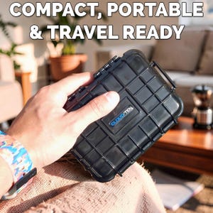 May include: A black, compact, and portable case with a grid pattern is held in a person's hand. The case has the text "CLOUD/TEN" in blue. The text "COMPACT, PORTABLE & TRAVEL READY" is at the top of the image.