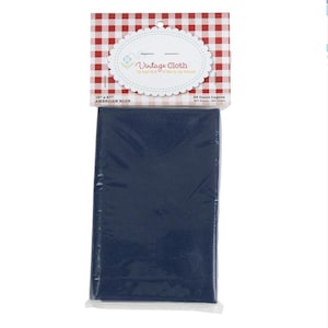 May include: A rectangular piece of dark blue fabric for needlework, packaged in a clear plastic sleeve with a red and white gingham header card. The label reads Vintage Cloth, 46 cm by 69 cm, and 28 Count Lugana, 52 per cent cotton.