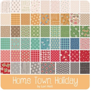 May include: A collection of 42 fabric squares featuring various holiday-themed patterns, including snowflakes, stars, plaid, and floral designs. The fabric squares are arranged in a grid pattern and are labelled "Home Town Holiday" by Lori Holt.