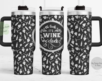 May include: A black and silver stainless steel tumbler with a handle. The tumbler has a white design with grapes, wine glasses, and a corkscrew. The text "Oh look it's wine o'clock" is printed on the tumbler.