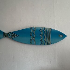 Fish Coastal Lake House Wall  art in shades of blue, white, and gold