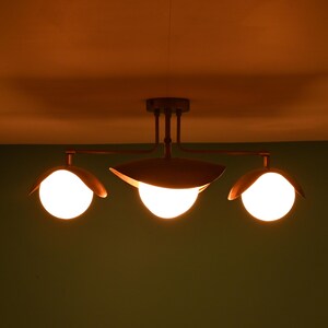 Minimal Brass Flush Mount Chandelier With Four Opal Globes And Curved Leaf Shades, Contemporary Decor