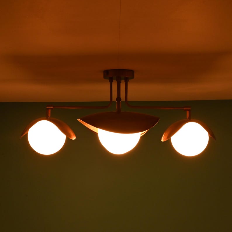 Minimal Brass Flush Mount Chandelier With Four Opal Globes And Curved Leaf Shades, Contemporary Decor