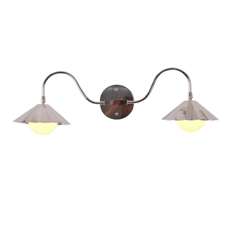 Modern double wall sconce with curved chrome arms and scalloped metal shades