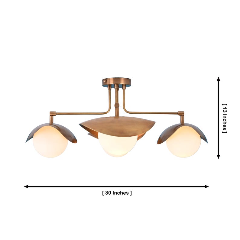Mid Century Modern Brass Flush Mount With Four White Globe Lights And Sculptural Metal Leaf Shades