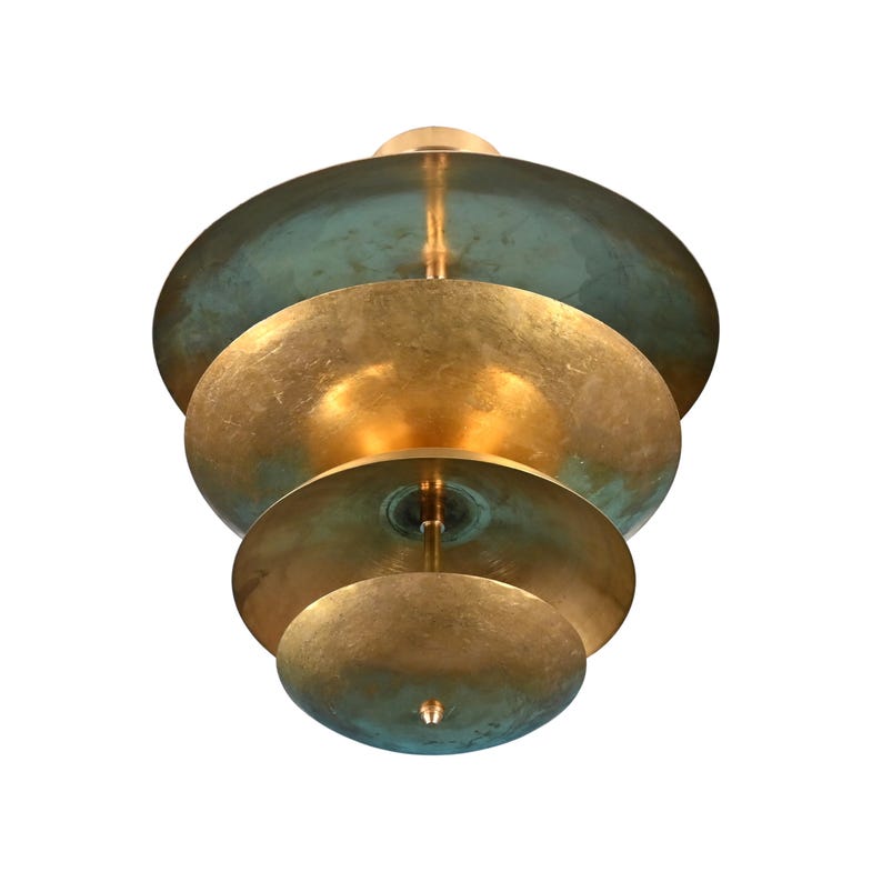 Sculptural brass flush mount chandelier in antique brass and oxidized patina, designer ceiling lighting for home interiors