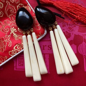 DOMINIQUE DENAIVE Paris Silk Road Off-White and Black Resin Gold Plated Metal Dangling Sticks Clip-on Earrings French Designer Jewelry
