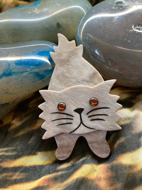 Pavone brooch deals