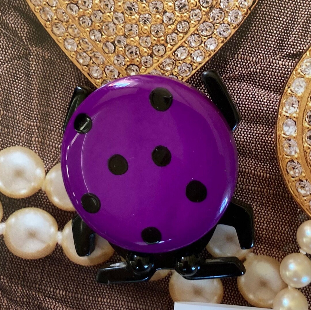 Broche coccinelle en strass et émail rouge