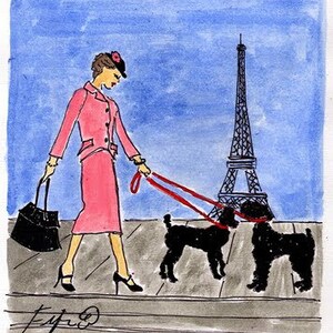 May include: Watercolor illustration of a woman in a pink suit walking two black dogs on red leashes in front of the Eiffel Tower. She carries a black handbag. The background is blue.