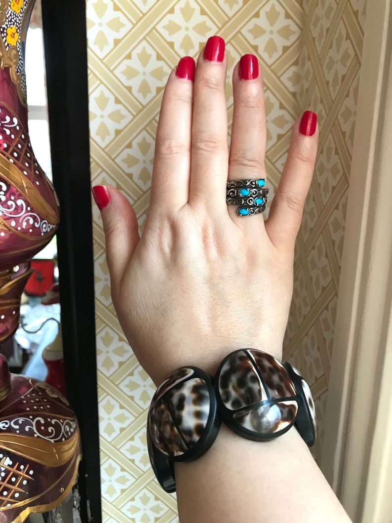 MARION GODART Paris Bracelet \u00c9lastiqu\u00e9 Coquille Cauri Black Resin and Natural Tiger Cowry Scarab Bracelet French Designer Jewelry