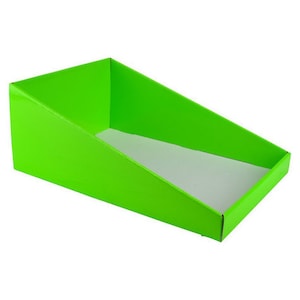 May include: A bright green cardboard display stand with a slanted front and a white interior. The stand is designed to hold small items for retail display.