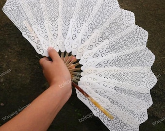 Folding Fan Made of Leather With Batik Carvings