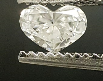 0.15 Carat Earth Mined Natural Heart-shaped Diamond set in a silver prong setting