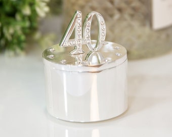 May include: Silver keepsake box with a crystal-encrusted number 40 on the lid.