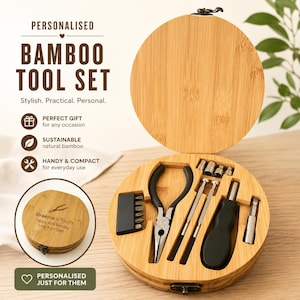May include: A personalised bamboo tool set in a round wooden case. The set includes pliers and screwdrivers. The case is engraved with text and has a hinged lid. The text on the case reads "BAMBOO TOOL SET".