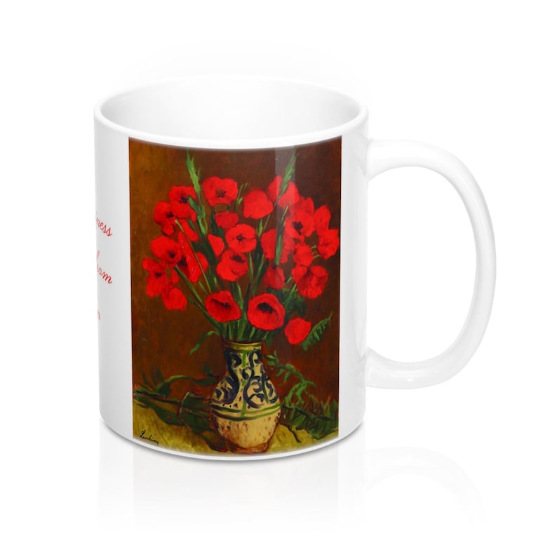 May include: White ceramic mug featuring a floral still life painting of red poppies in a decorative vase. The vase has a blue and white design. The mug also has text in red. A perfect gift for art lovers.