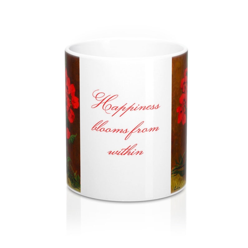 May include: White ceramic mug with a floral design and the text "Happiness blooms from within" in red script. The mug features a brown background with red flowers.