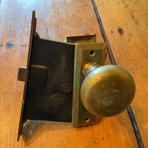 Antique PF Corbin Mortise Lock Set With Brass Knobs And Escutcheon Plates, Vintage Architectural Hardware. Circa 1920s