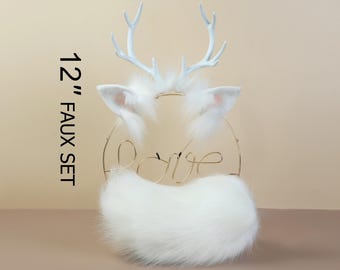 May include: White faux fur tail and ears with a white deer antler headband. The headband has a gold wire "love" design. 12" Faux Set.