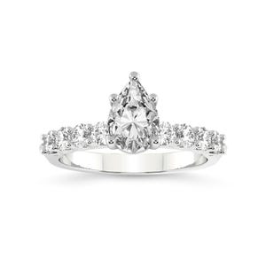 K&ouml;nnte beinhalten: Ein Verlobungsring mit einem birnenf&ouml;rmigen Diamanten in Pav&eacute;-Fassung. Der Ring ist aus Wei&szlig;gold gefertigt und hat einen gro&szlig;en, birnenf&ouml;rmigen Diamanten in der Mitte, der von kleineren Diamanten umgeben ist.